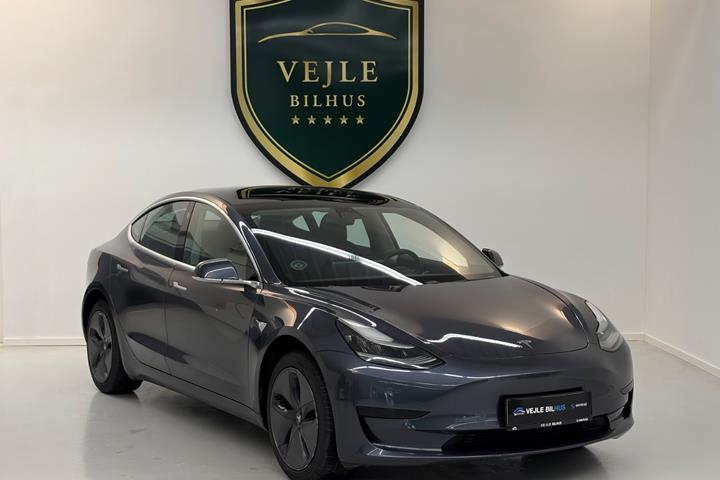 Grøn Tesla Model 3 fra 2019