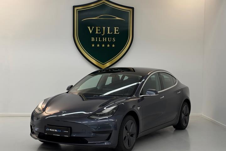 Grøn Tesla Model 3 fra 2019