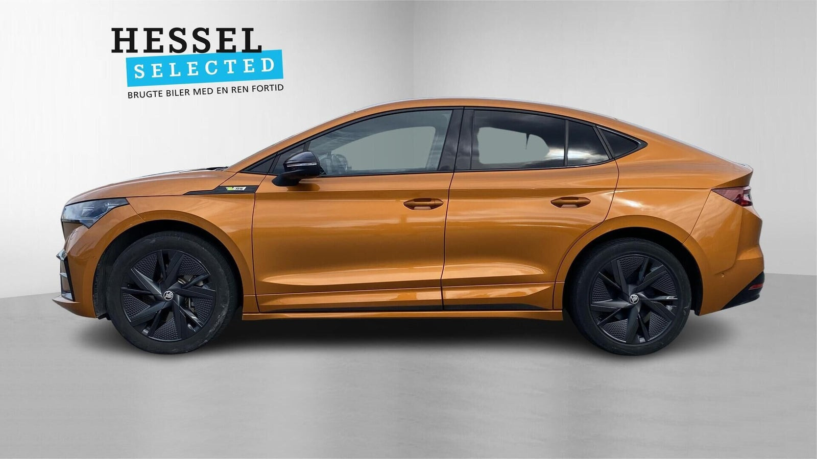 Orange Skoda Enyaq fra 2023