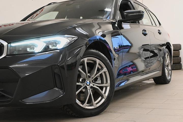 Sort BMW 320e fra 2023