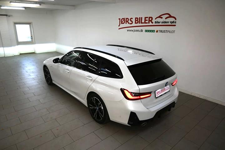 Hvid BMW 320e fra 2024