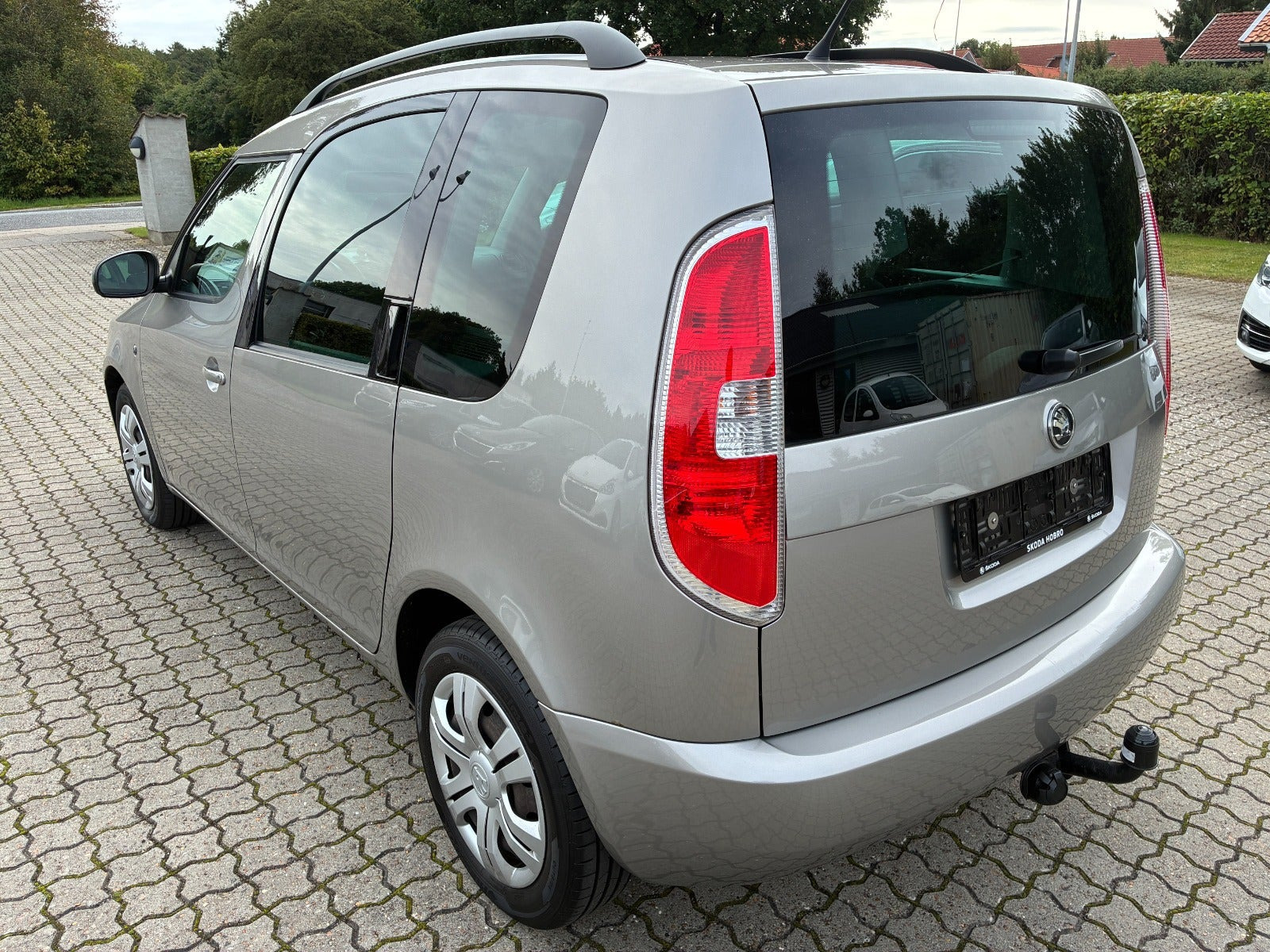 Orange Skoda Roomster fra 2014