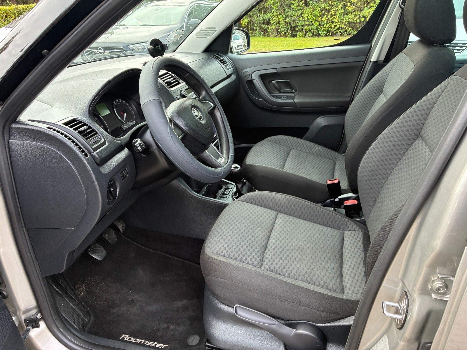 Orange Skoda Roomster fra 2014