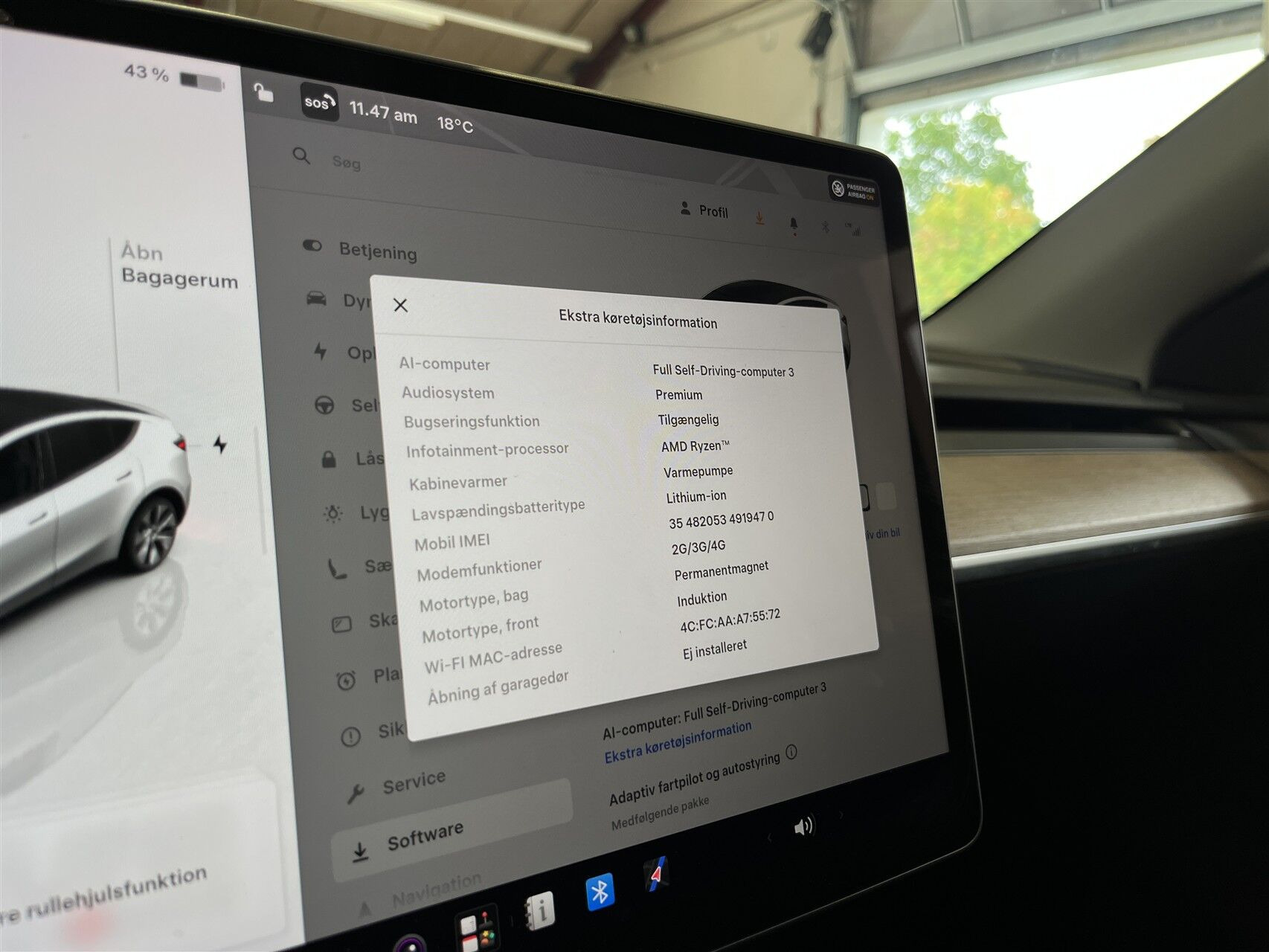 Hvid Tesla Model Y fra 2023