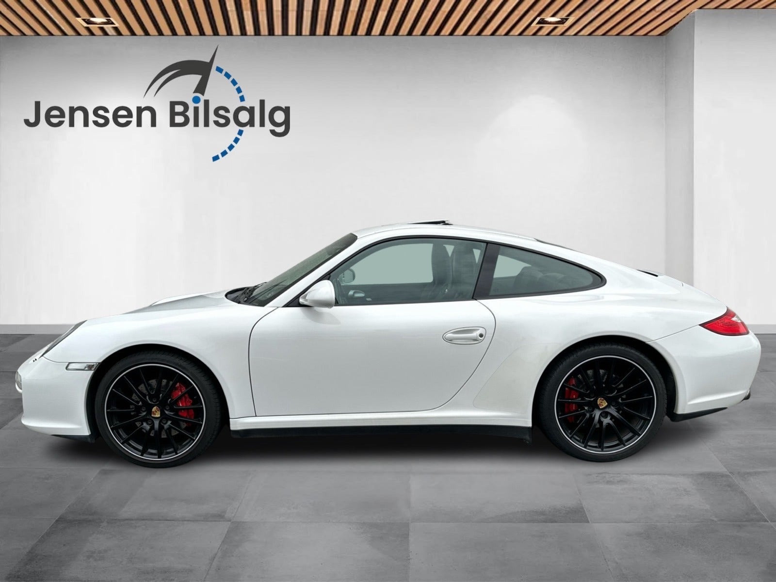 Gul Porsche 911 Carrera 4S fra 2009