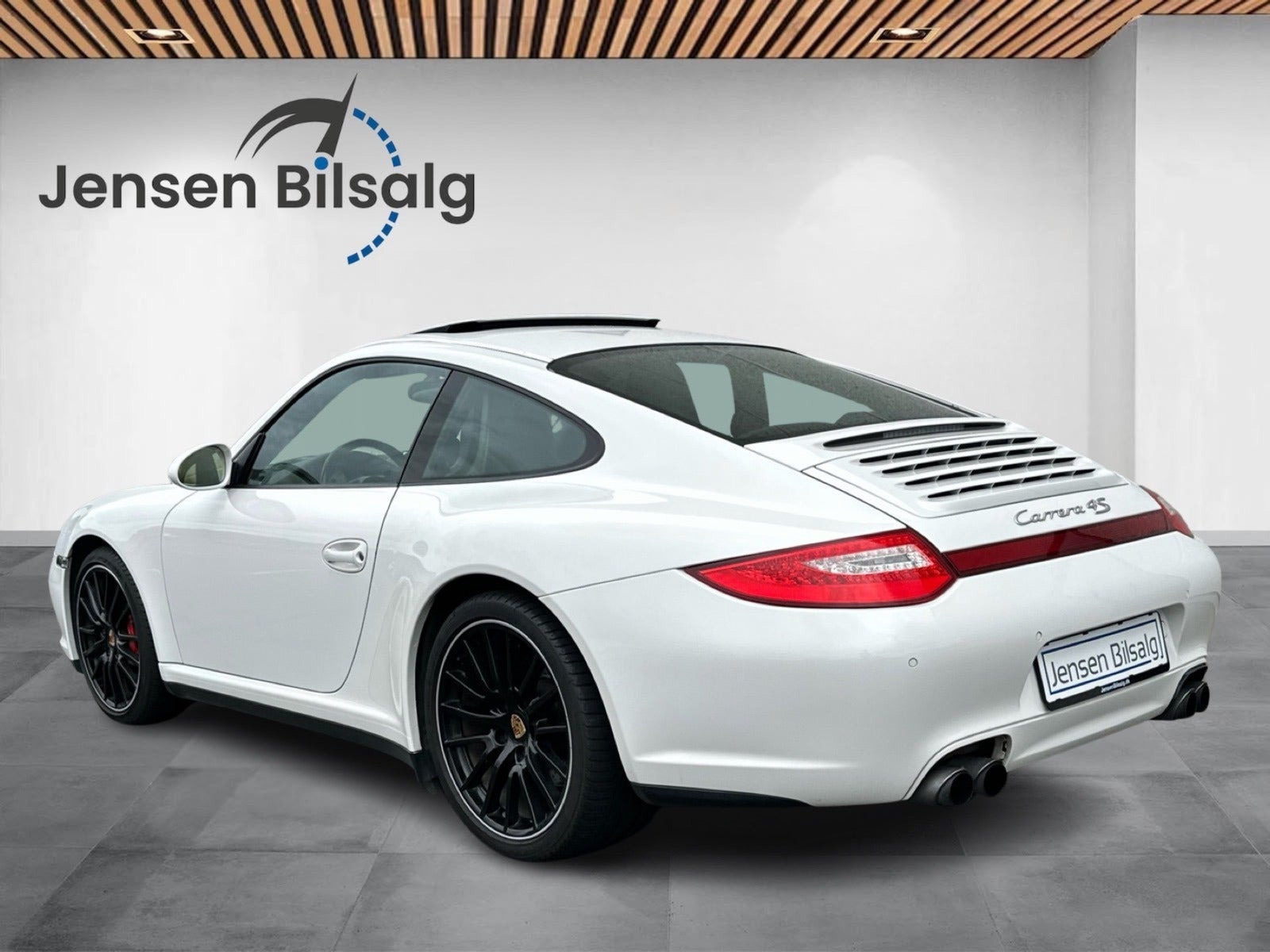 Gul Porsche 911 Carrera 4S fra 2009