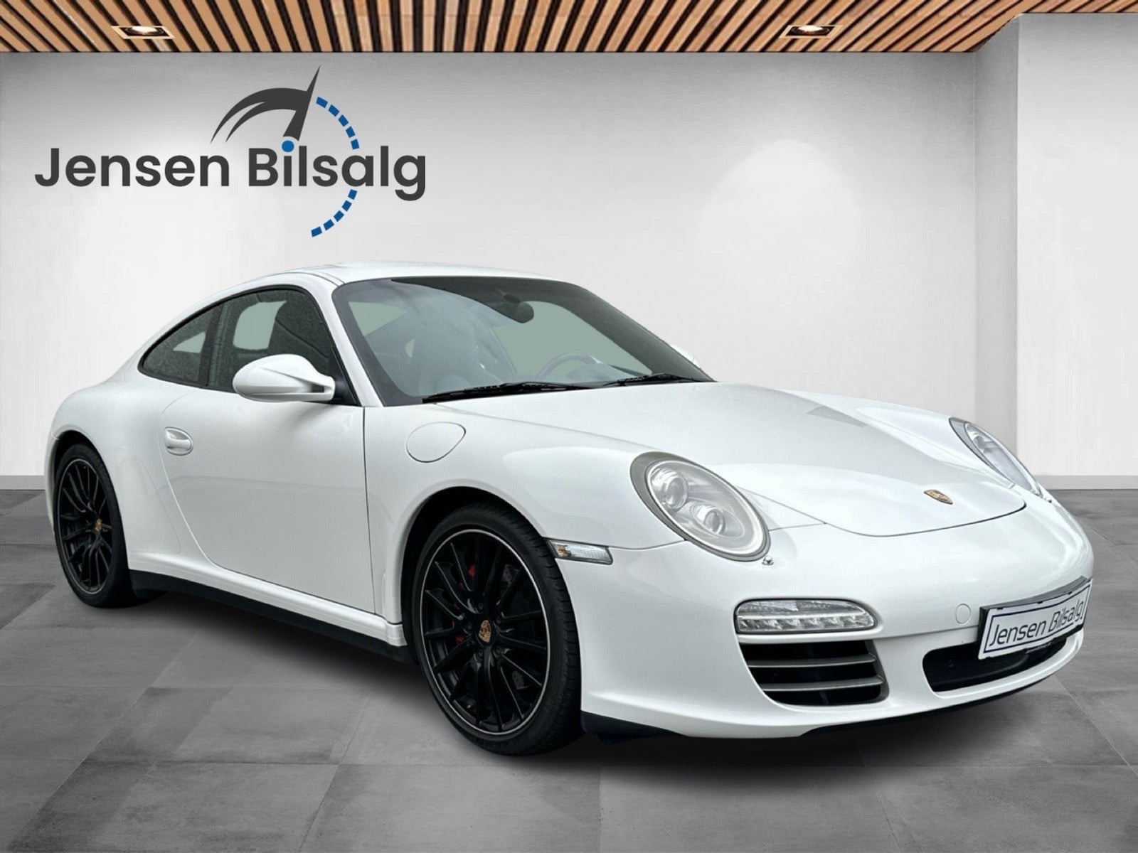 Gul Porsche 911 Carrera 4S fra 2009
