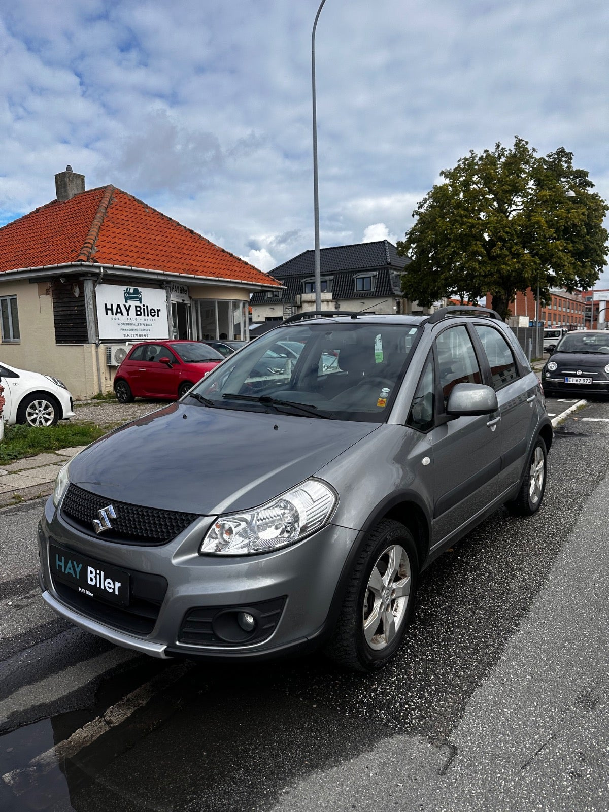 Grå Suzuki SX4 fra 2011
