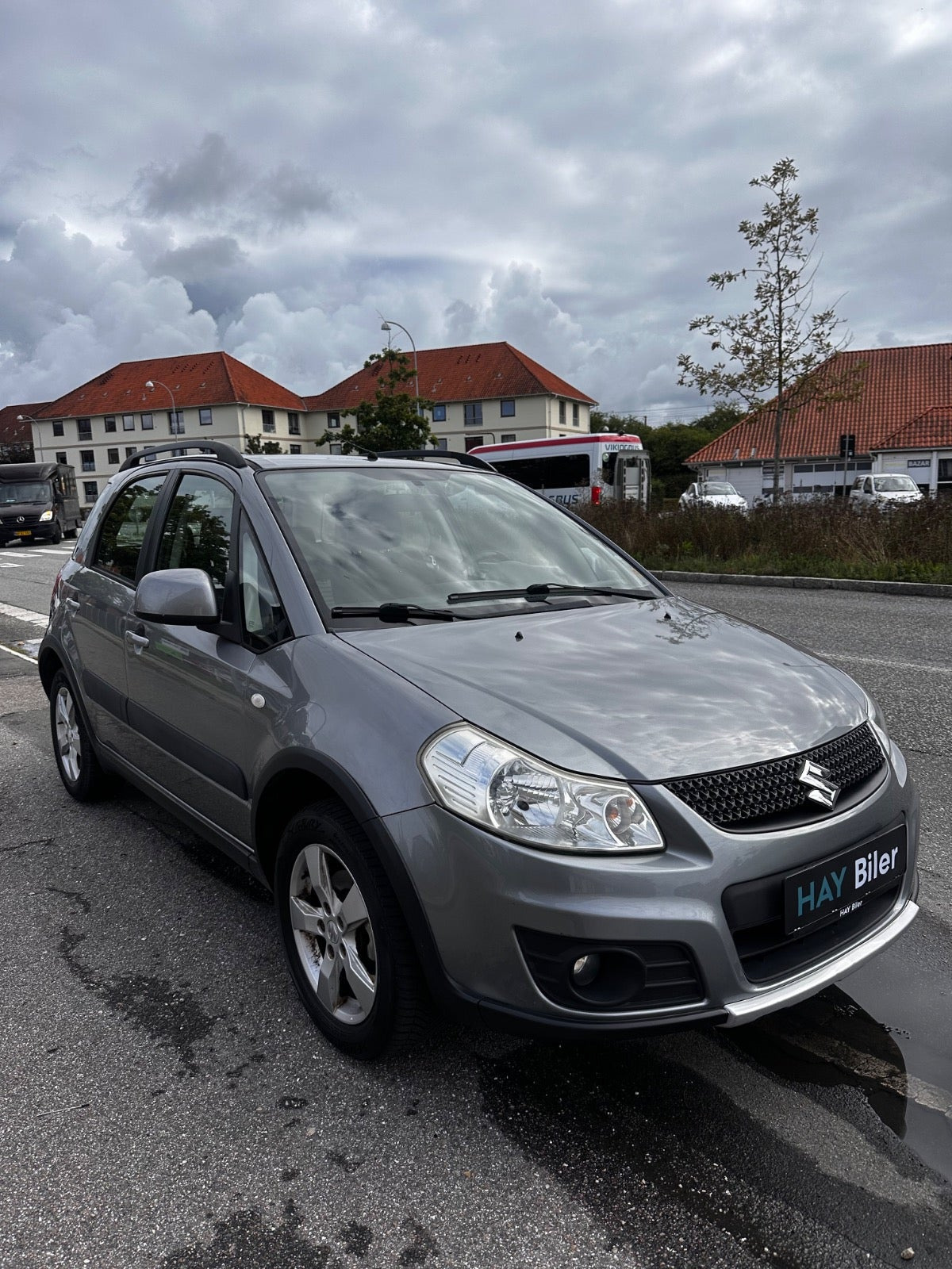 Grå Suzuki SX4 fra 2011