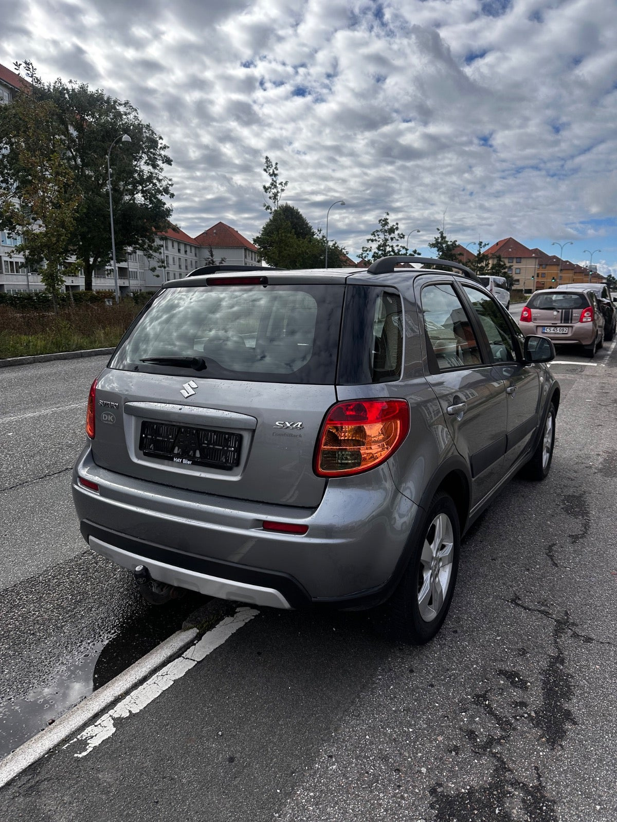Grå Suzuki SX4 fra 2011