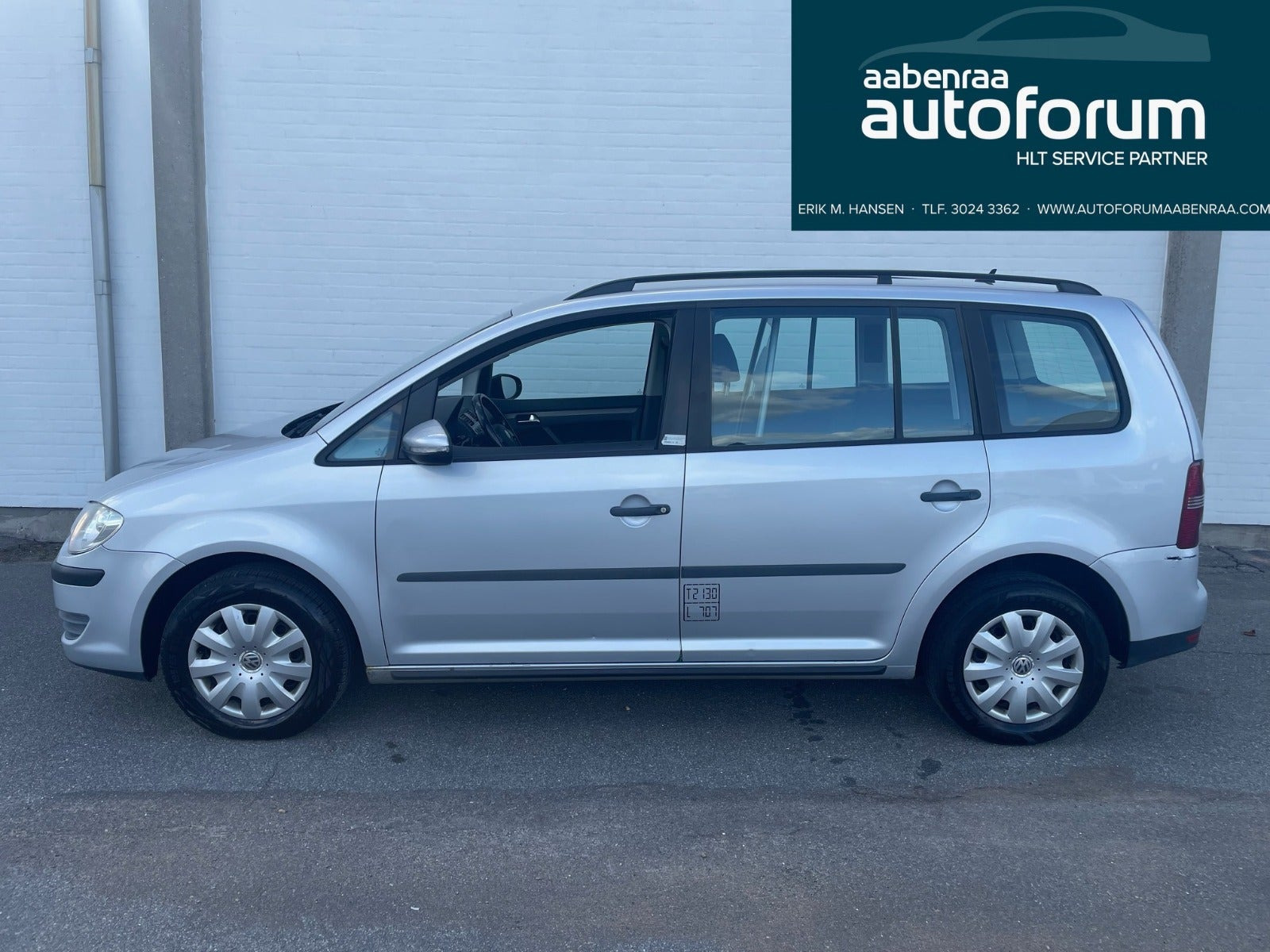 Sølv VW Touran fra 2009