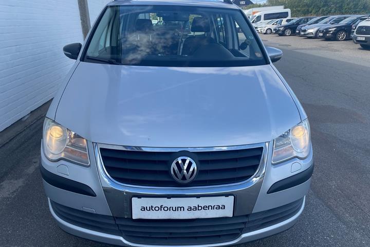Sølv VW Touran fra 2009