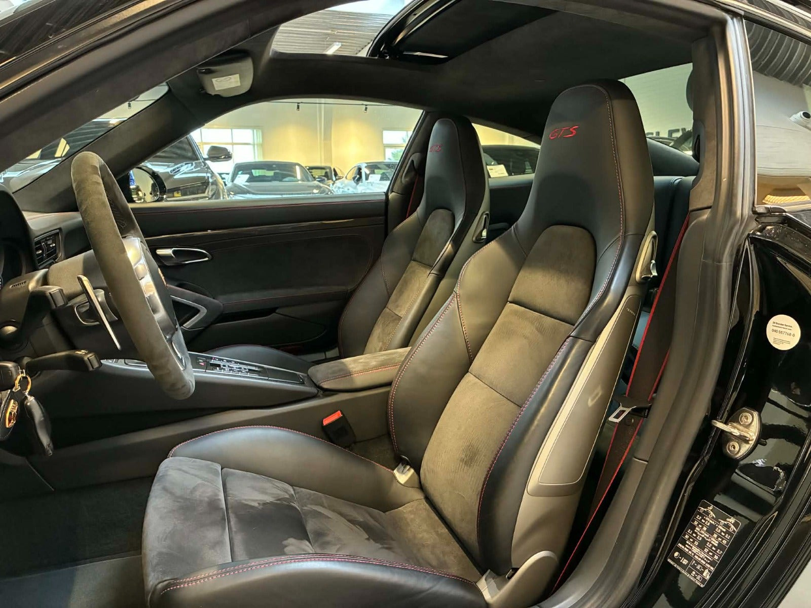 Sort Porsche 911 Carrera GTS fra 2015