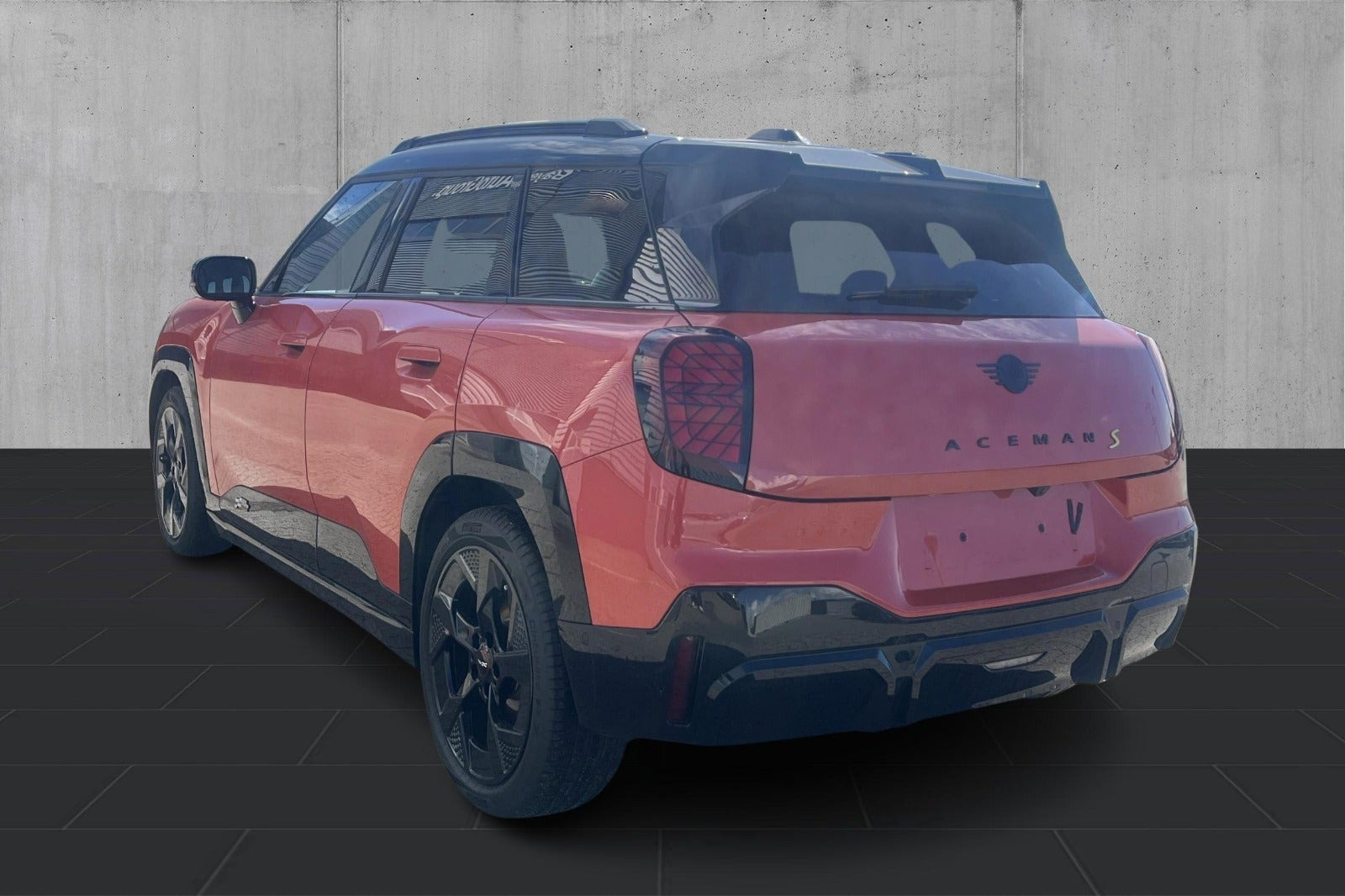 Rød Mini Aceman SE fra 2025