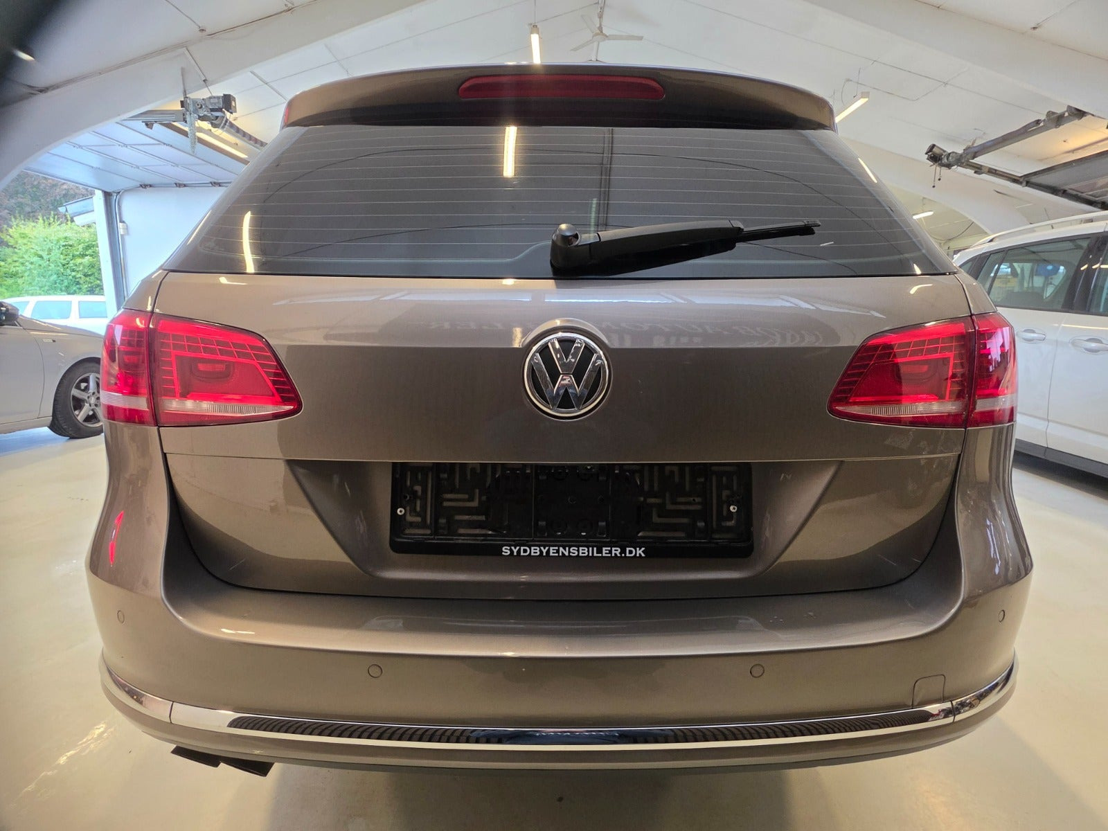 Orange VW Passat fra 2011