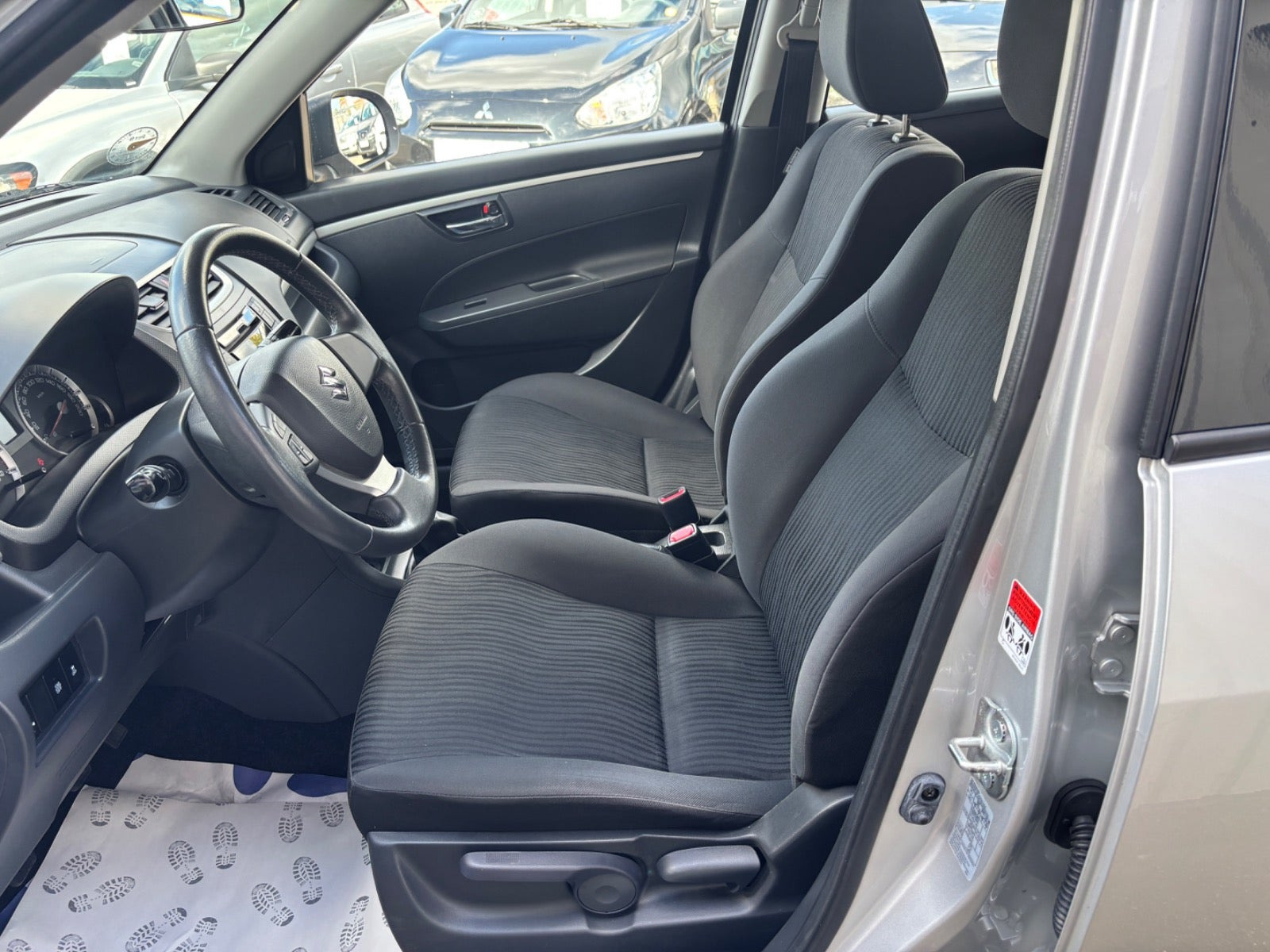 Sølv Suzuki Swift fra 2012