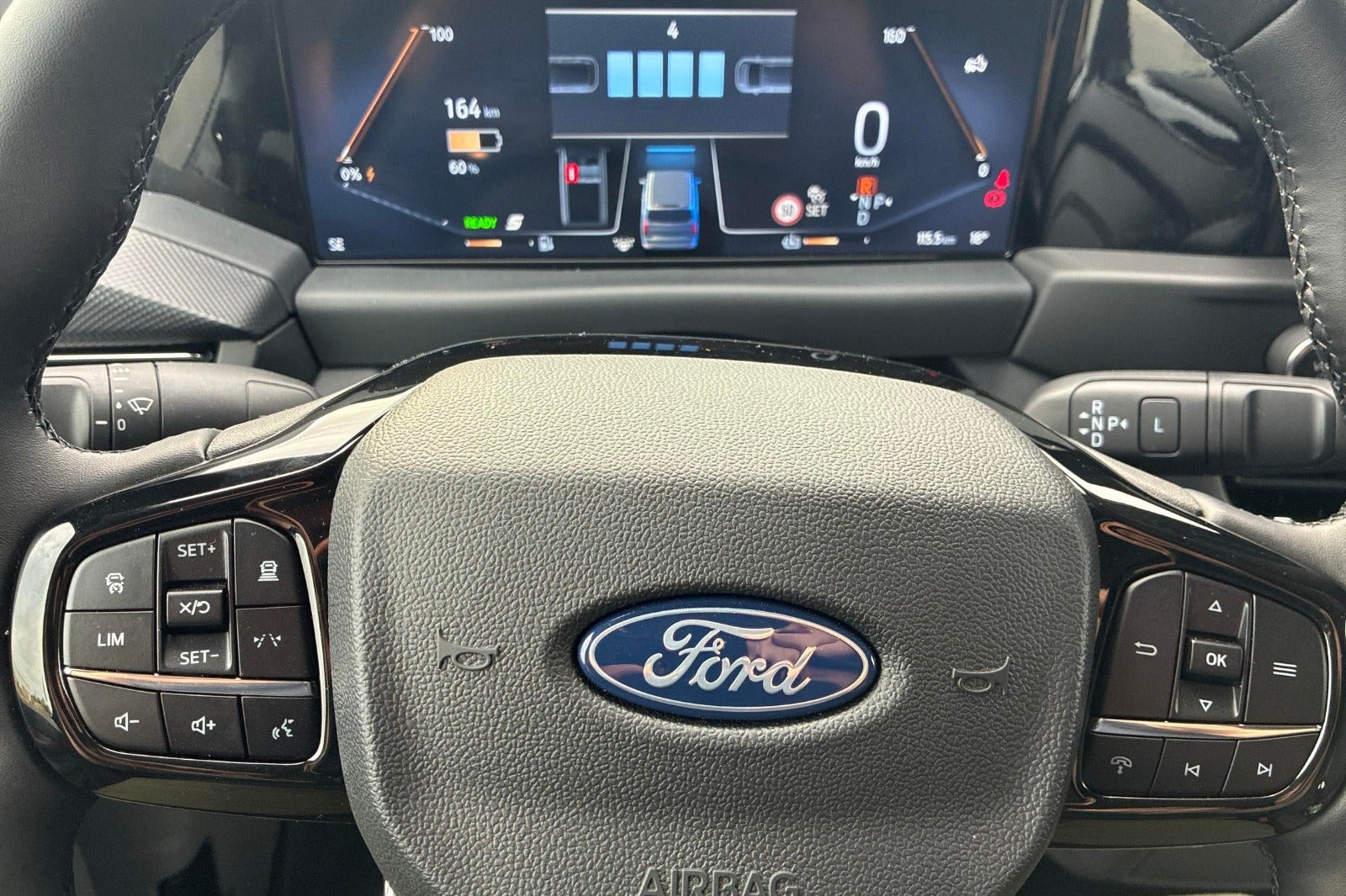 Grå Ford E-Transit Custom 320 L1 fra 2026