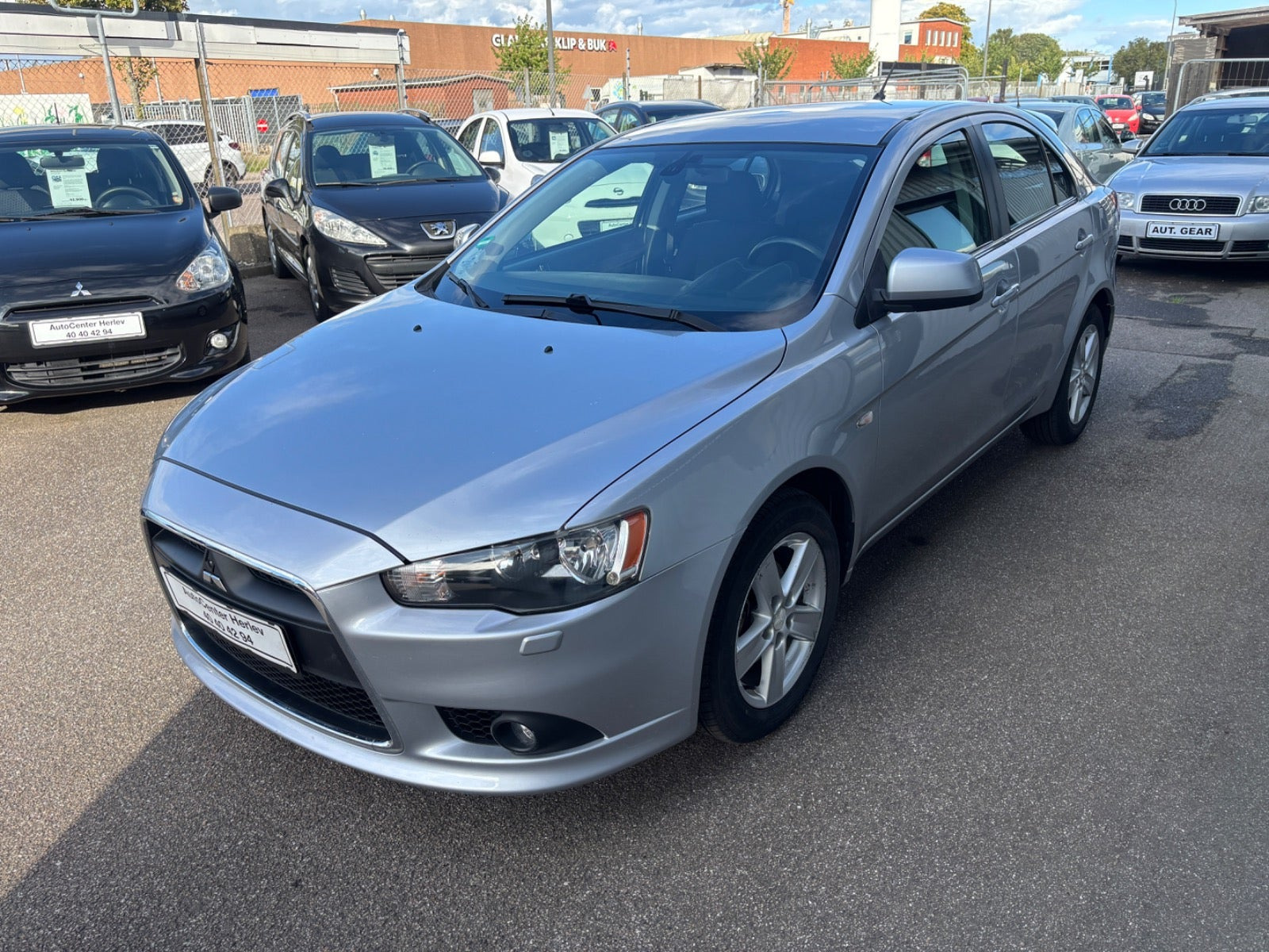 Sølv Mitsubishi Lancer fra 2010