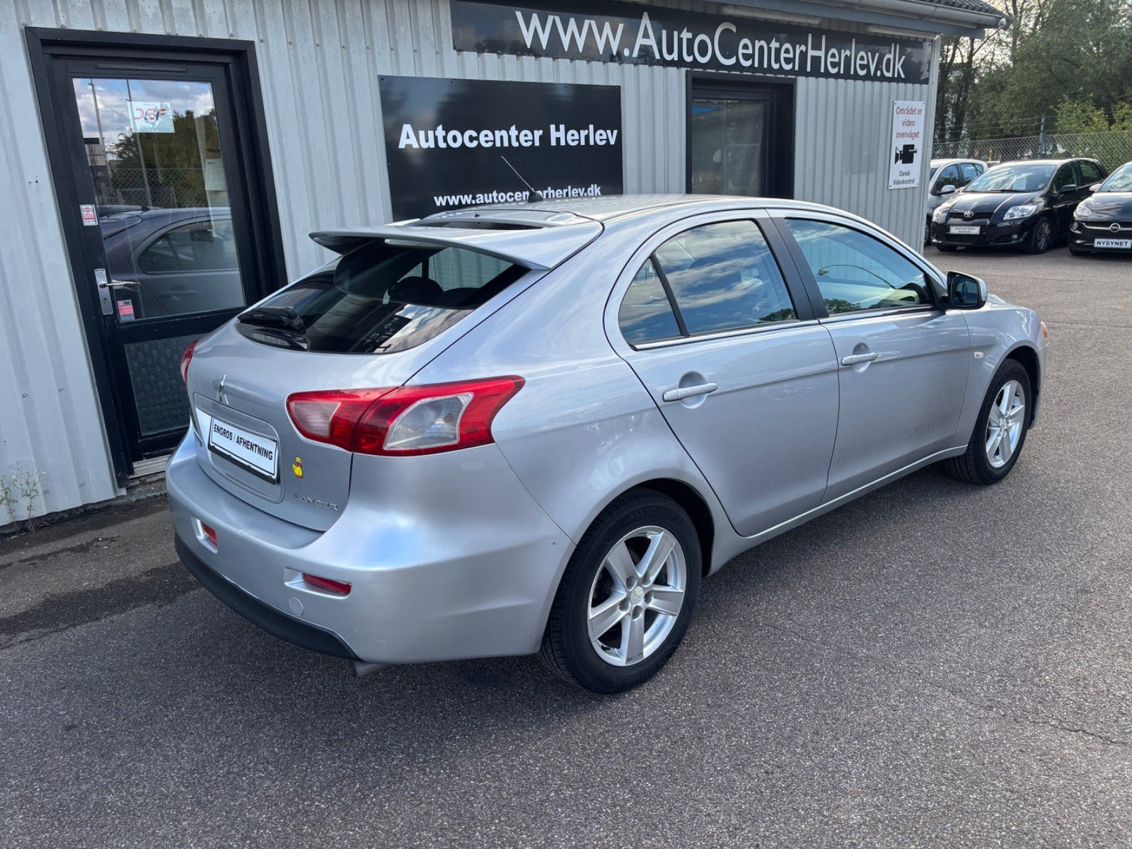 Sølv Mitsubishi Lancer fra 2010