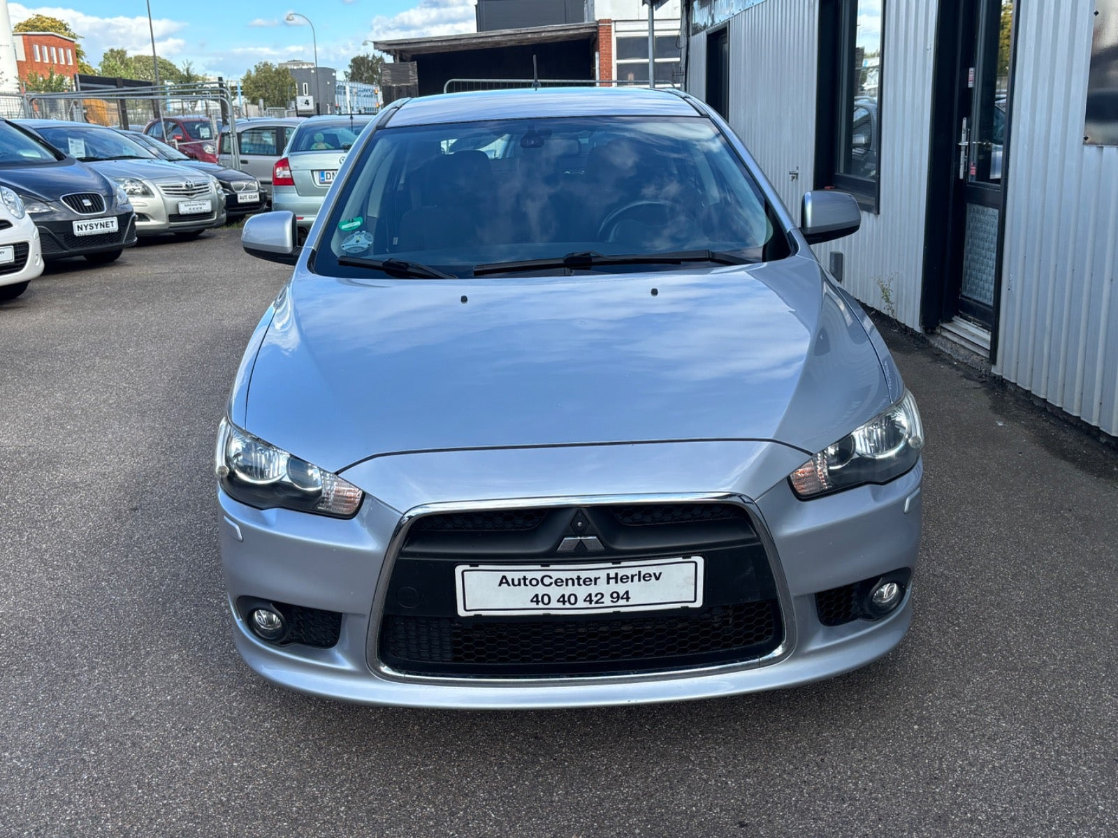 Sølv Mitsubishi Lancer fra 2010