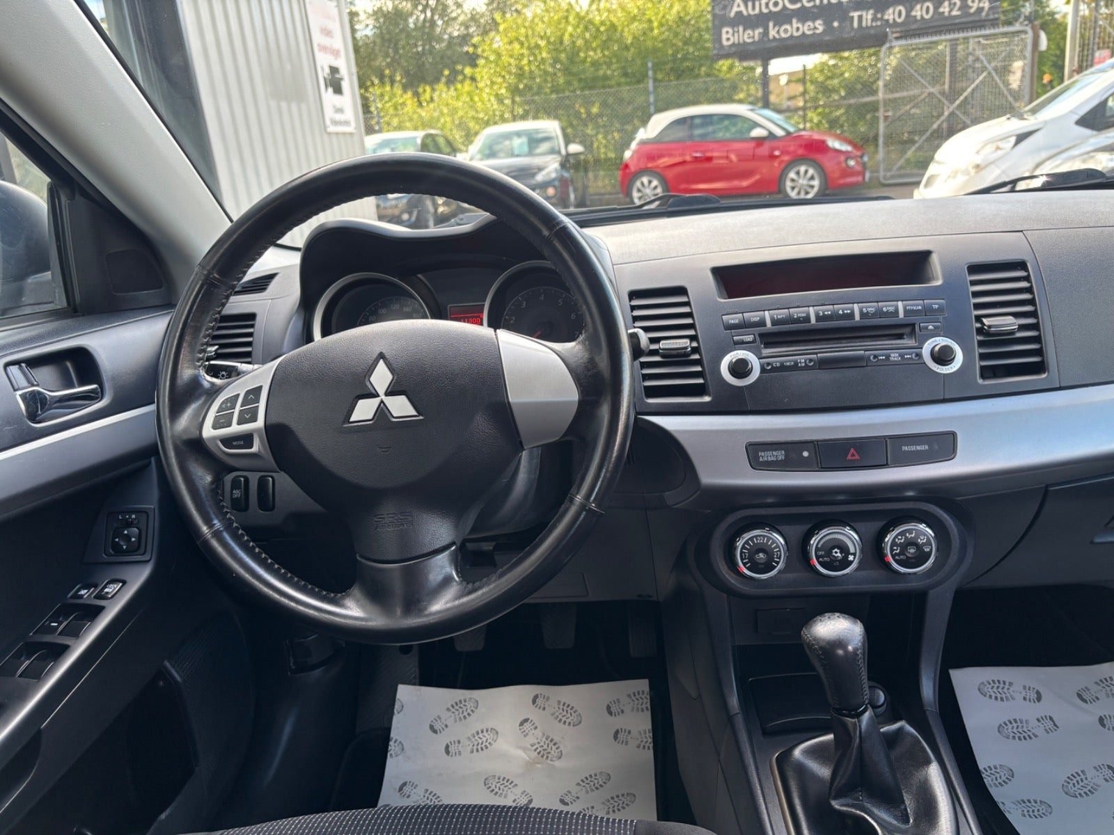 Sølv Mitsubishi Lancer fra 2010