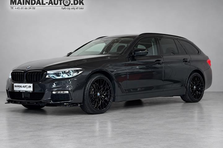 Sort BMW 520d fra 2018 set udefra