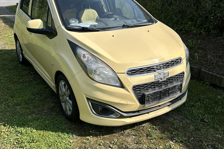 Gul Chevrolet Spark fra 2013
