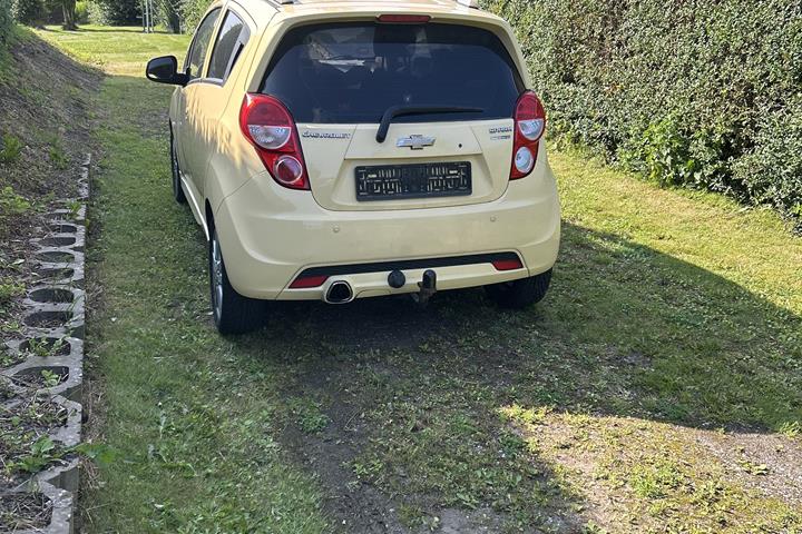 Gul Chevrolet Spark fra 2013