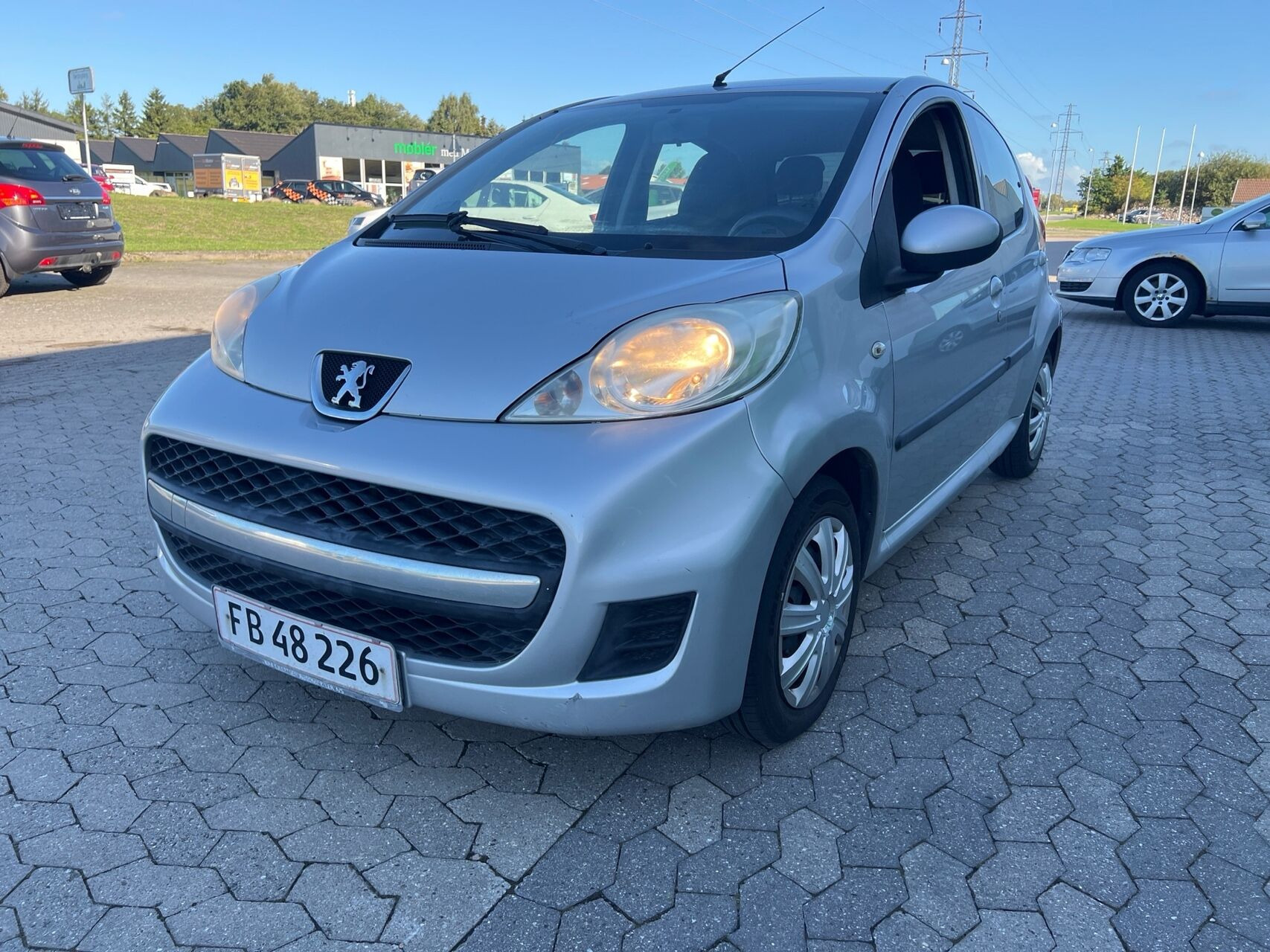 Sølv Peugeot 107 fra 2011