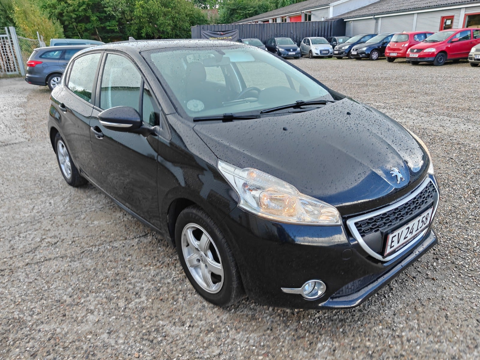 Gul Peugeot 208 fra 2014