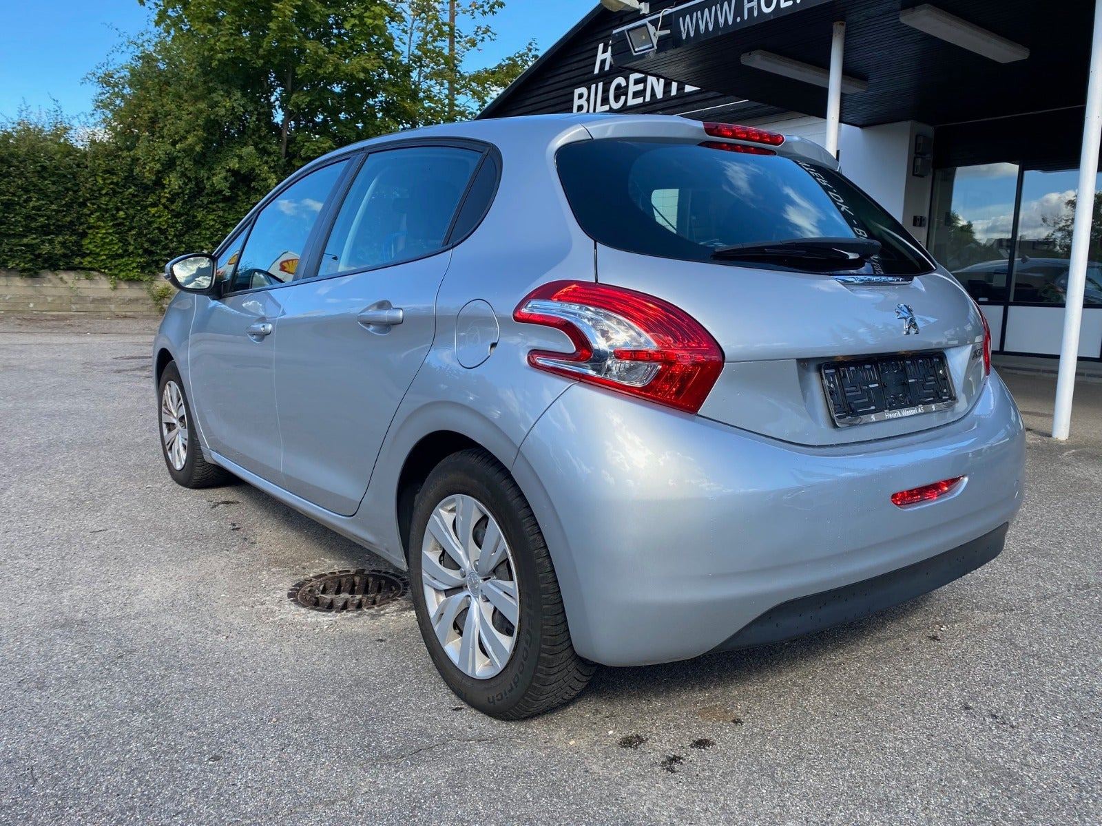 Sølv Peugeot 208 fra 2012