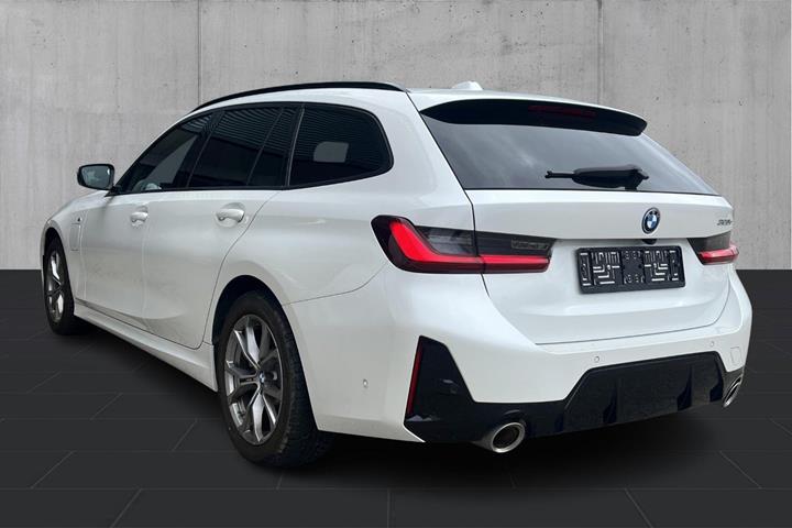 Hvid BMW 320e fra 2024