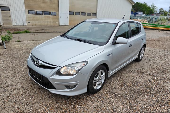 Gul Hyundai i30 fra 2010
