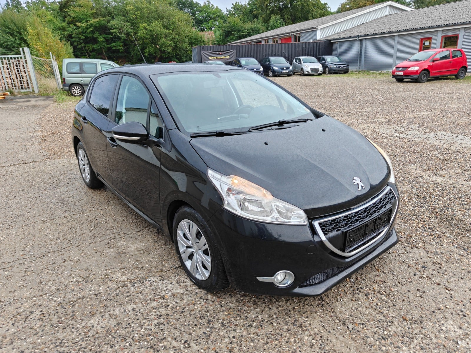 Gul Peugeot 208 fra 2014