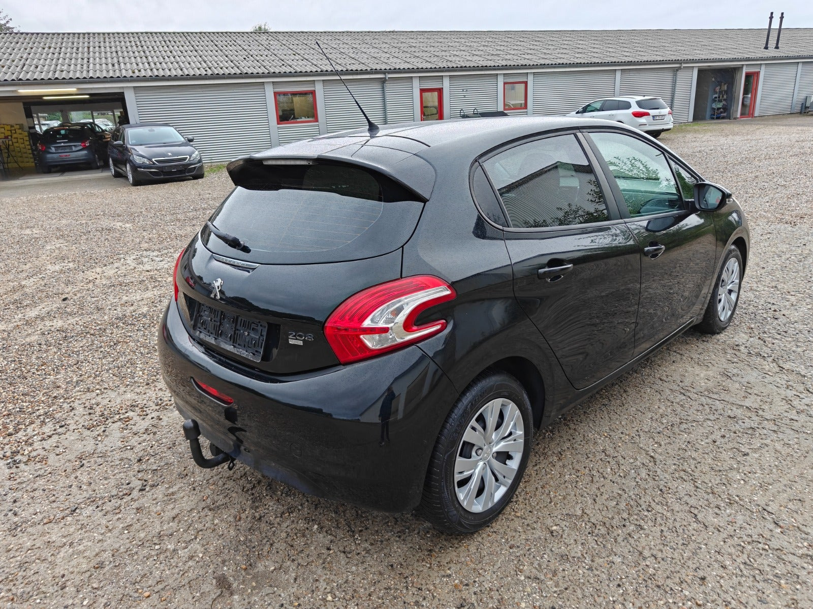 Gul Peugeot 208 fra 2014