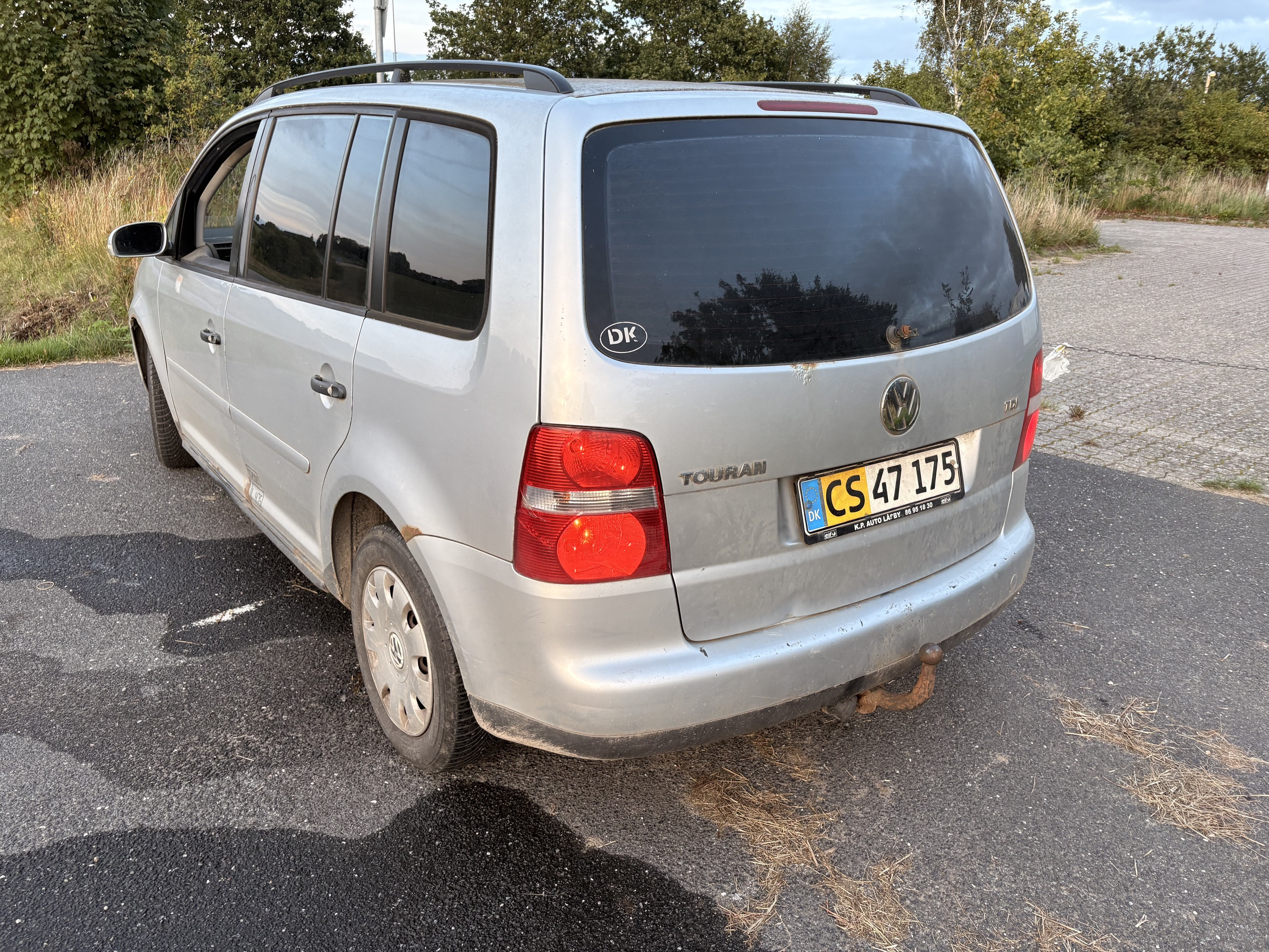 Sølv VW Touran fra 1995
