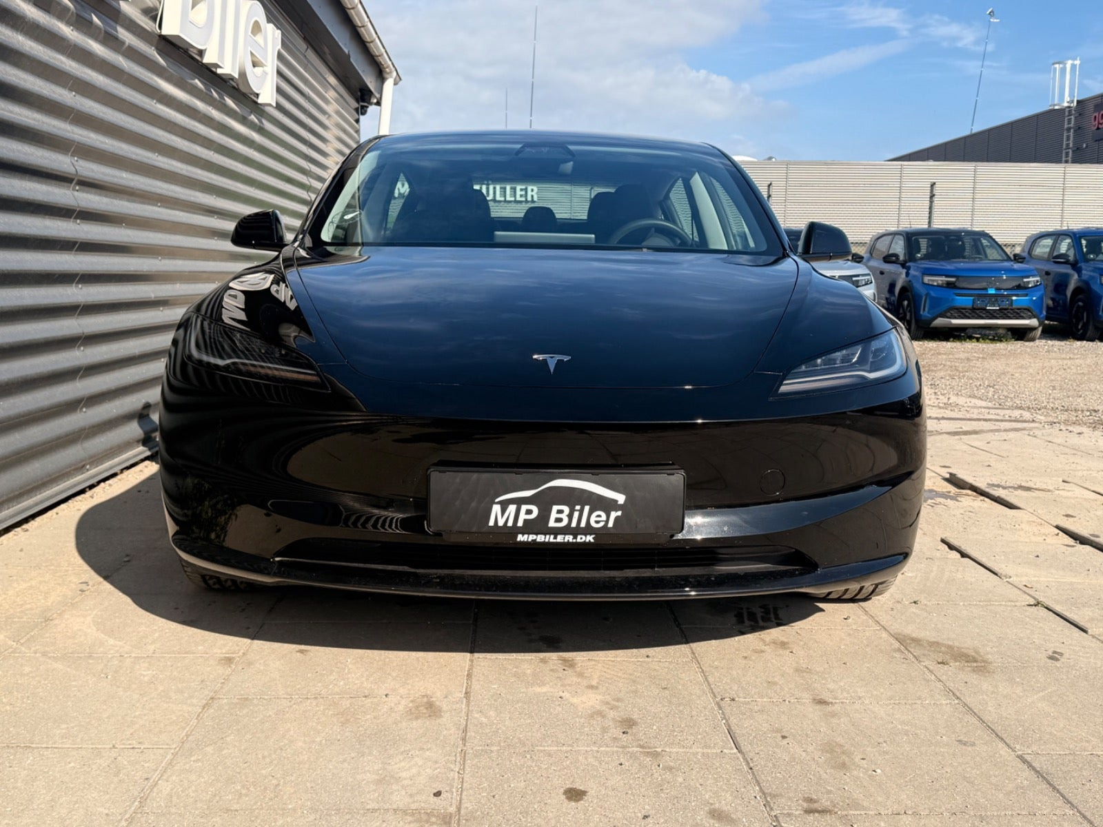 Sort Tesla Model 3 fra 2024