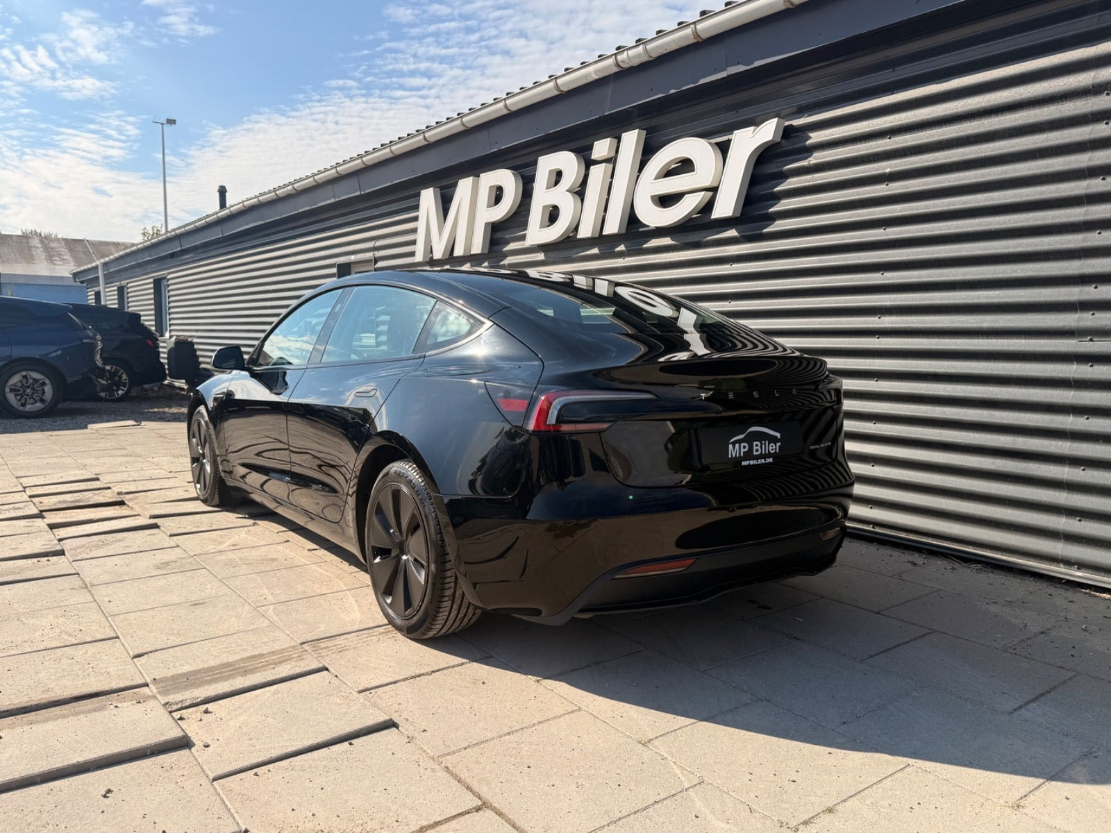 Sort Tesla Model 3 fra 2024