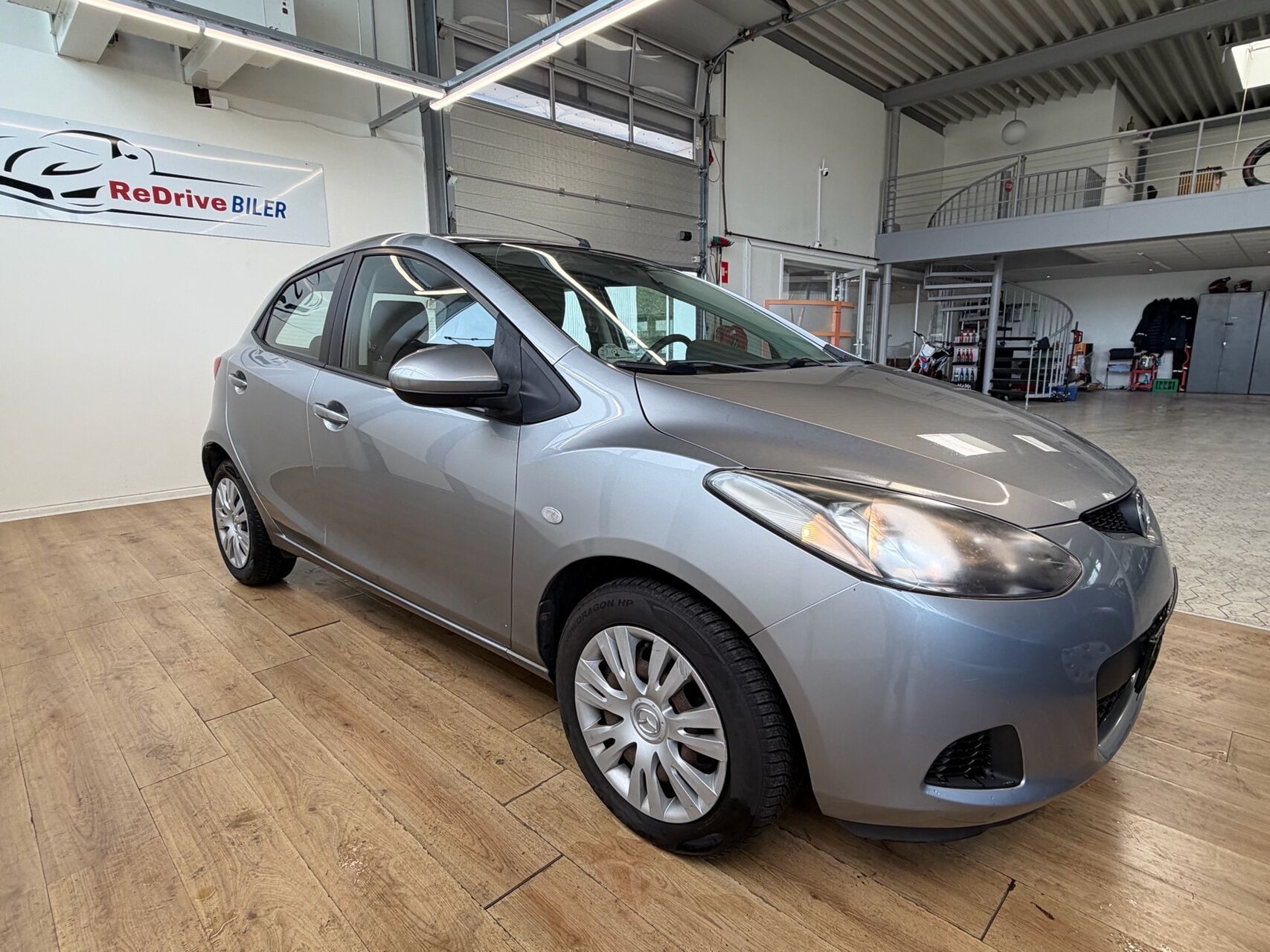 Sølv Mazda 2 fra 2009
