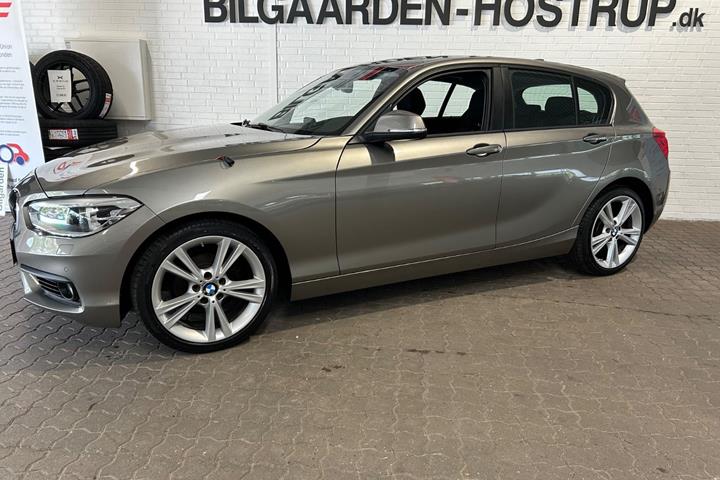 Orange BMW 118d fra 2017