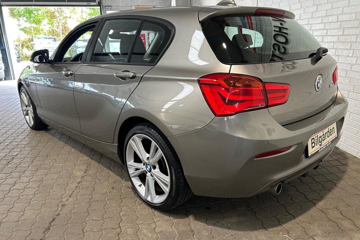 Orange BMW 118d fra 2017