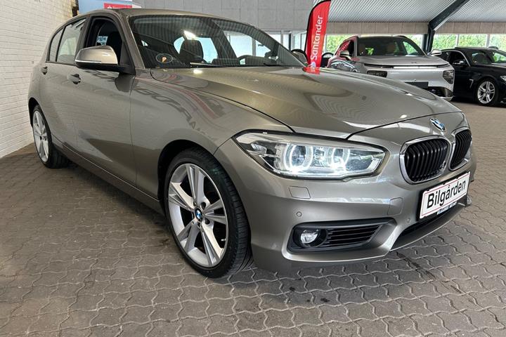 Orange BMW 118d fra 2017