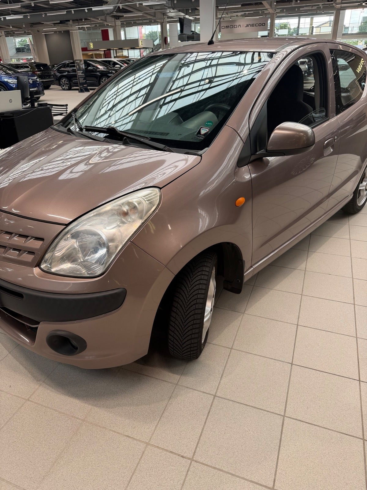 Orange Nissan Pixo fra 2010