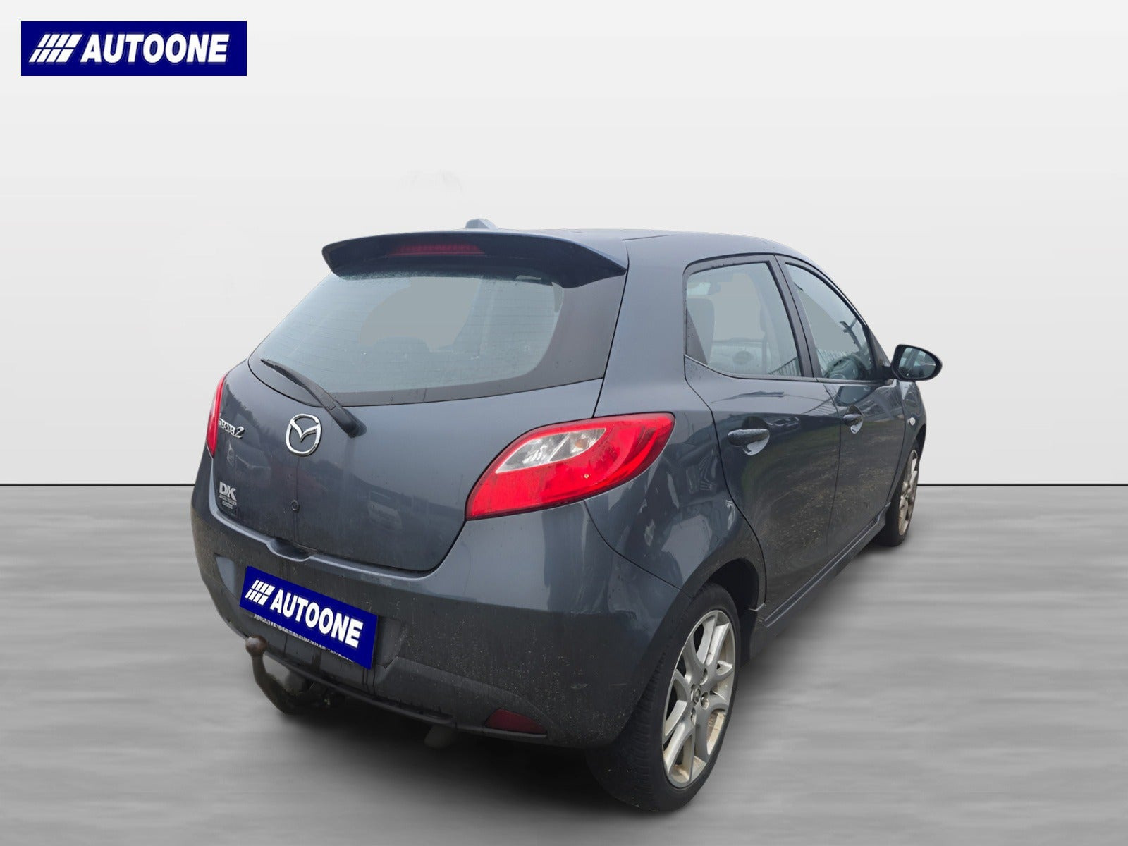 Grå Mazda 2 fra 2011