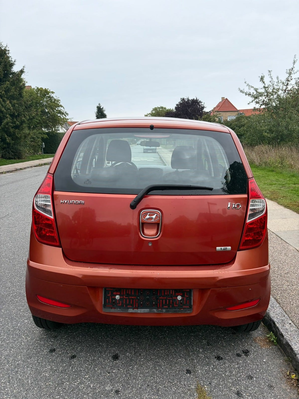 Rød Hyundai i10 fra 2013