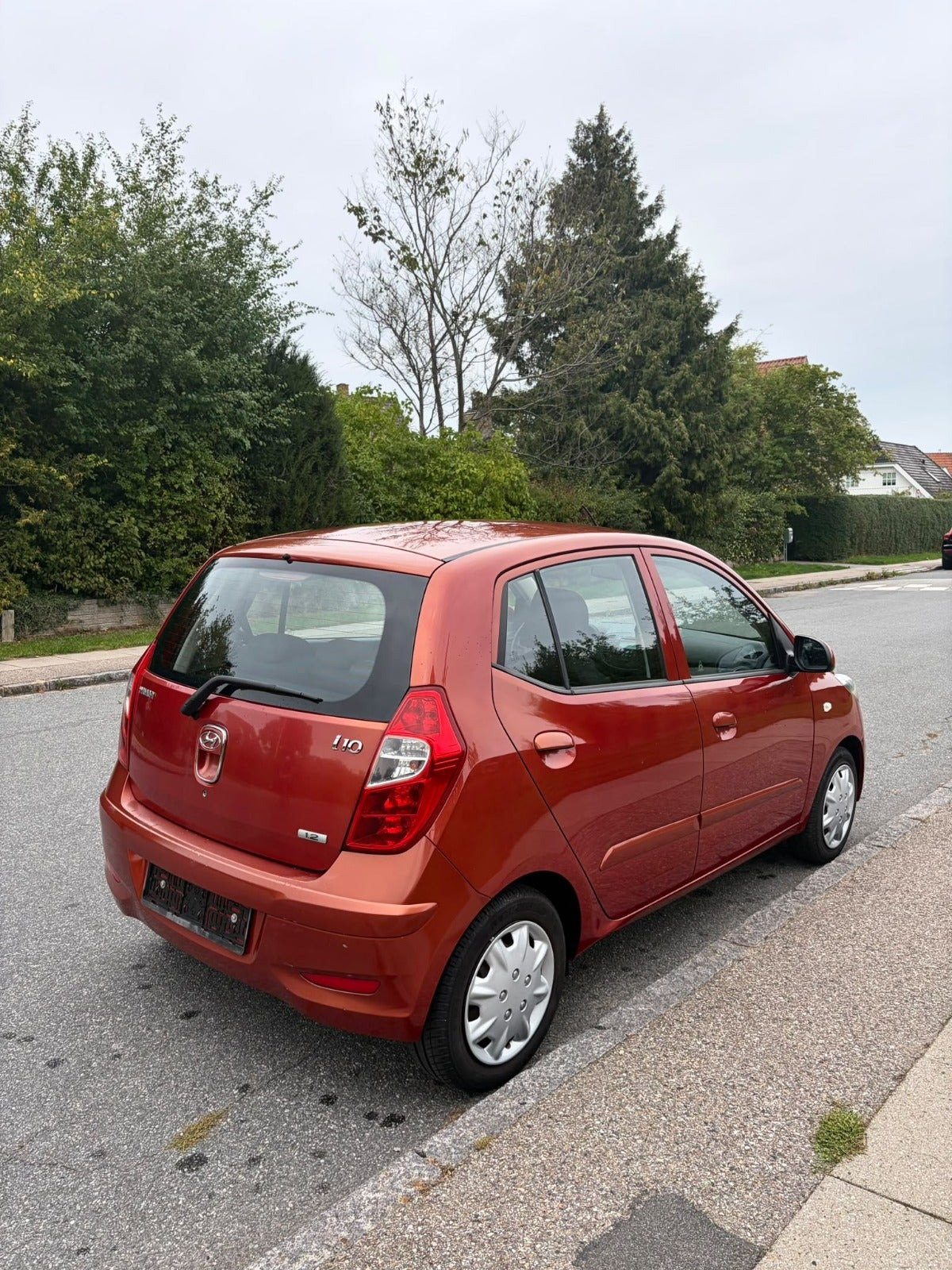 Rød Hyundai i10 fra 2013
