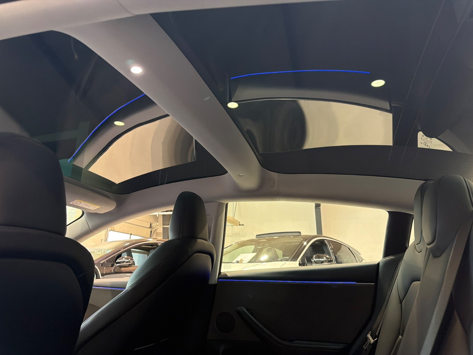 Hvid Tesla Model 3 fra 2026