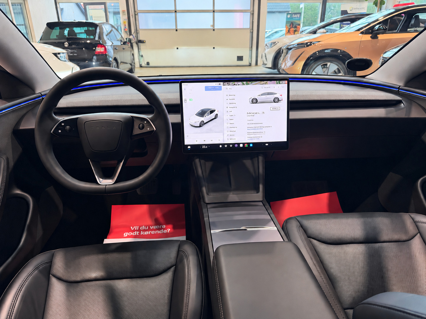 Hvid Tesla Model 3 fra 2026