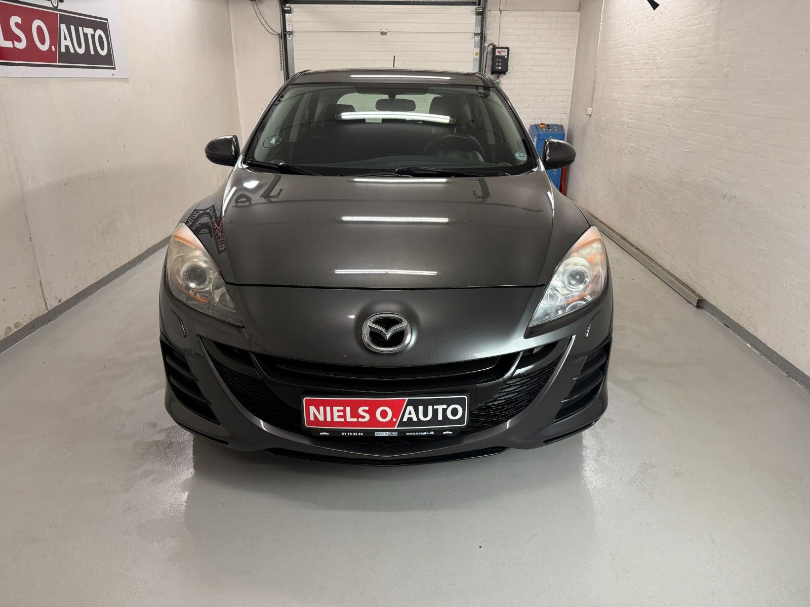 Grå Mazda 3 fra 2011