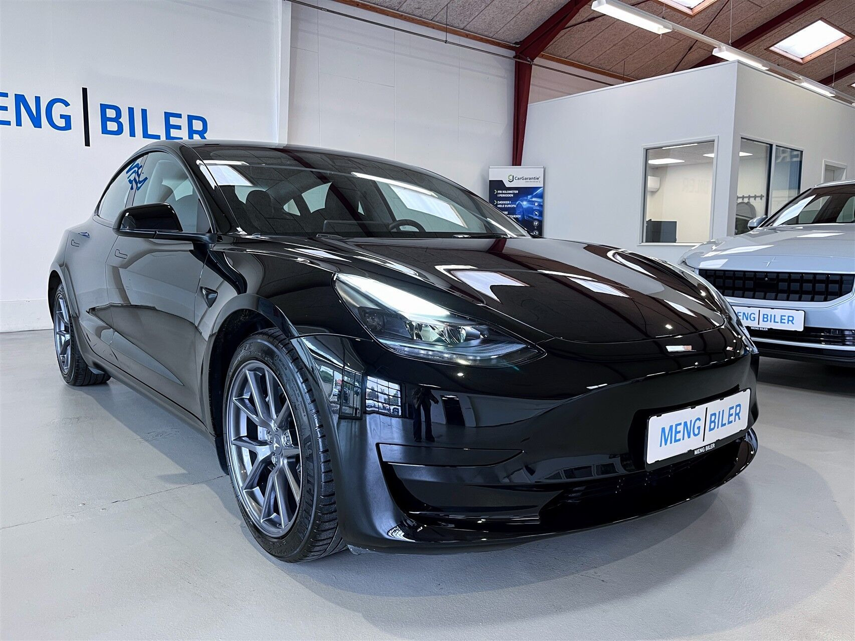Sort Tesla Model 3 fra 2023